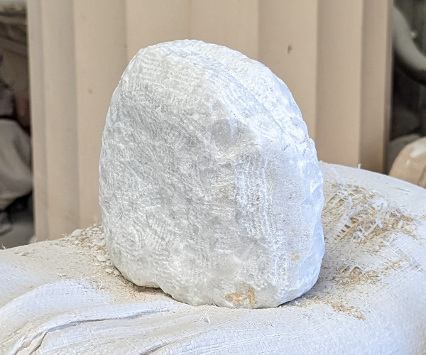 an abstract sculpture made from marble